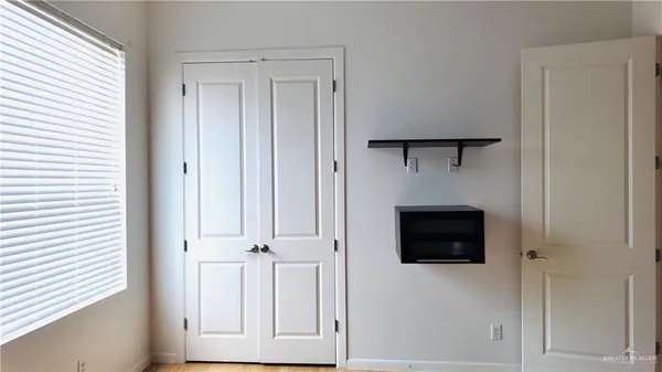 a view of a livingroom with a flat screen tv