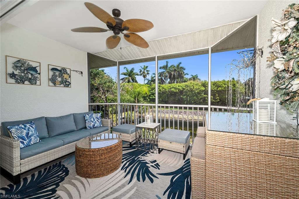 1747 Reuven Circle, Unit 4 Naples, FL 34112 - Photo 27 of 46 a living room with furniture