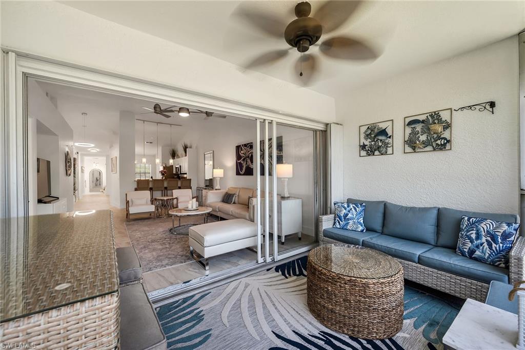 1747 Reuven Circle, Unit 4 Naples, FL 34112 - Photo 28 of 46 a living room with furniture