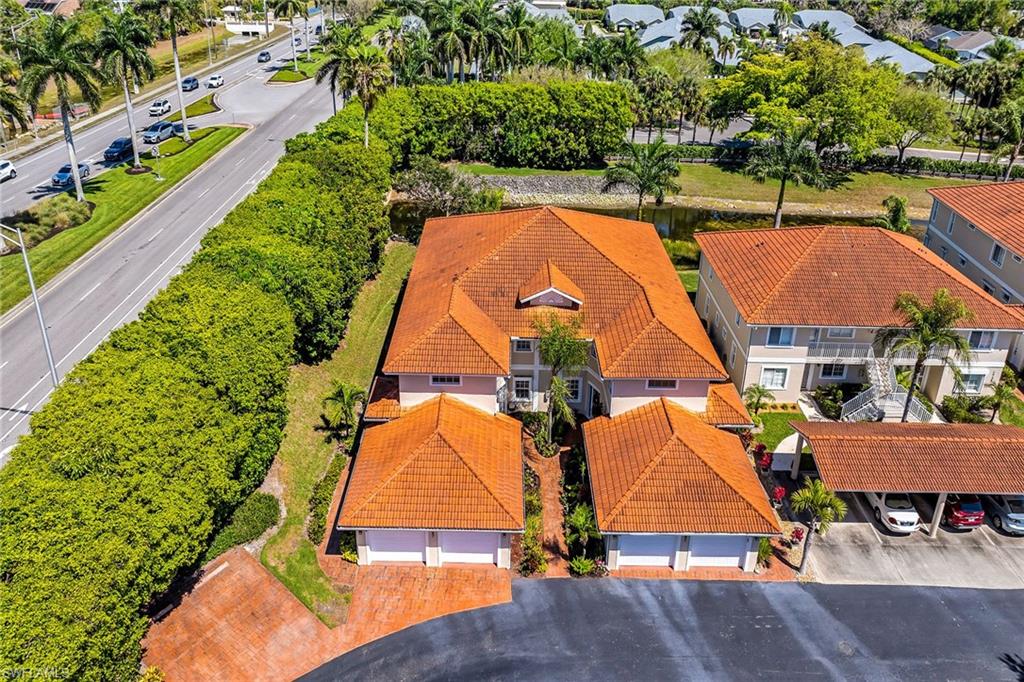 1747 Reuven Circle, Unit 4 Naples, FL 34112 - Photo 36 of 46 an aerial view of residential houses with outdoor space
