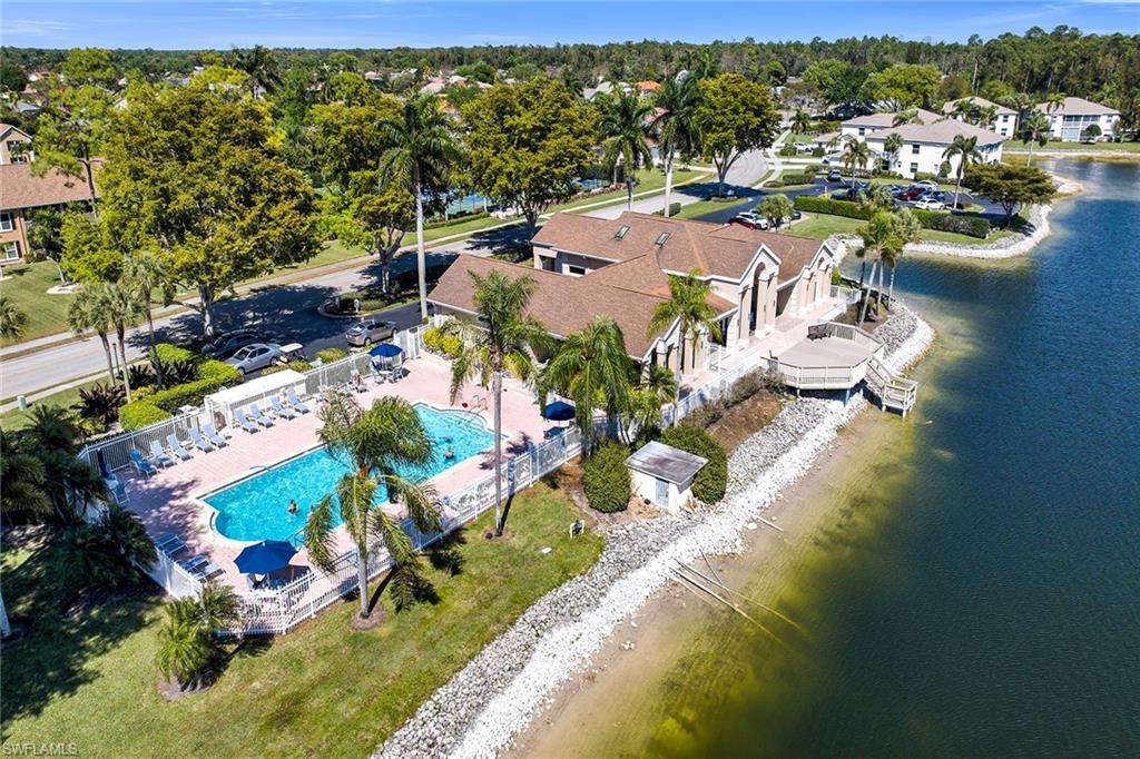1747 Reuven Circle, Unit 4 Naples, FL 34112 - Photo 44 of 46 an aerial view of residential houses with outdoor space