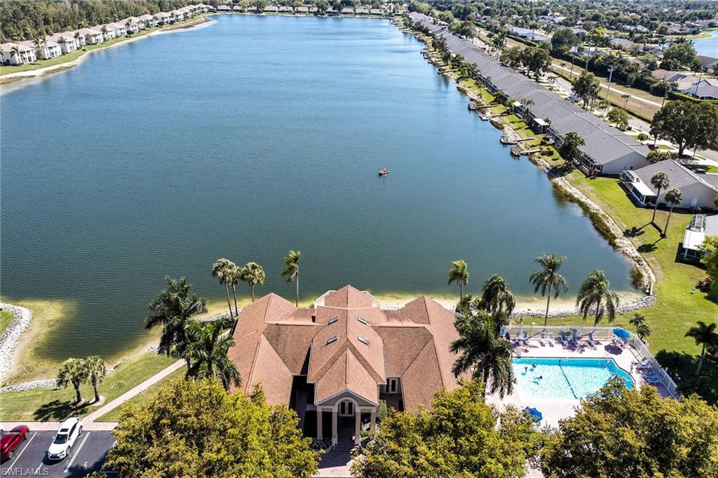 1747 Reuven Circle, Unit 4 Naples, FL 34112 - Photo 46 of 46 an aerial view of a house with swimming pool and outdoor space