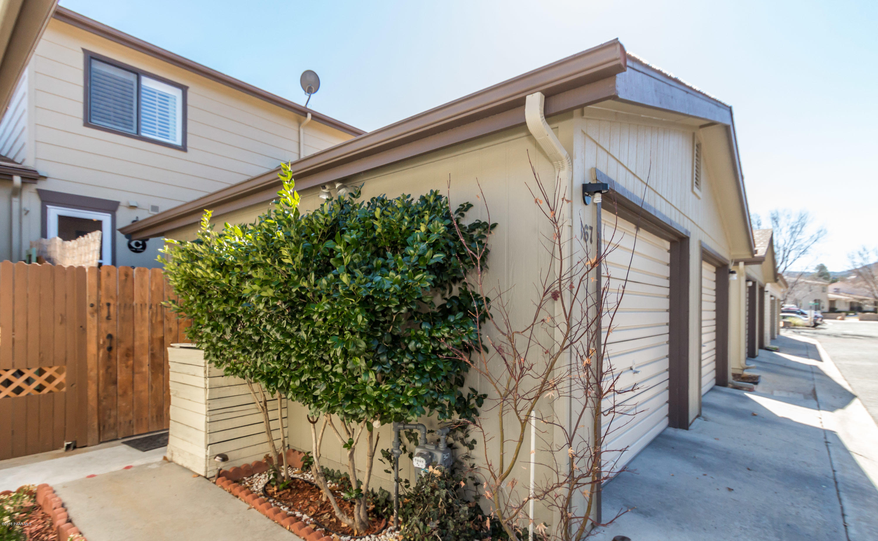 367 Rim Rock Circle, Unit 2 Prescott, AZ 86303 - Photo 1 of 17 001_Garage And Patio Entry