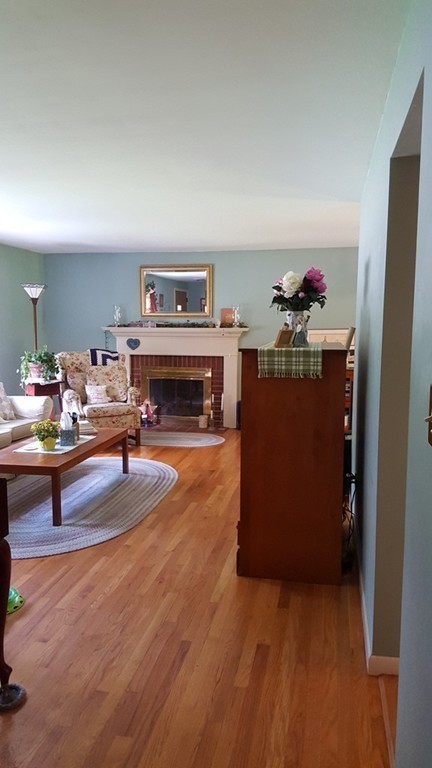 7 Pompano Road Worcester, MA 01605 - Photo 15 of 29 a living room with furniture and a wooden floor