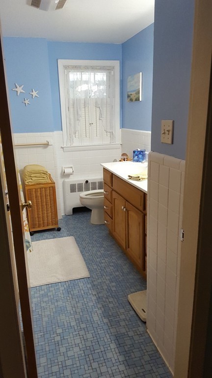 7 Pompano Road Worcester, MA 01605 - Photo 16 of 29 a bathroom with a tub sink and mirror