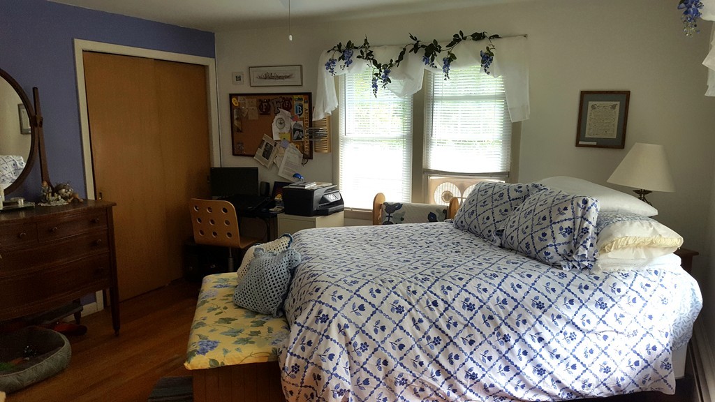 7 Pompano Road Worcester, MA 01605 - Photo 21 of 29 a bedroom with a bed and wooden floor