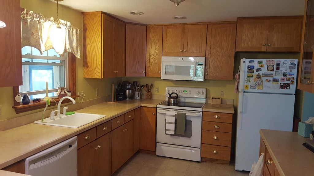 7 Pompano Road Worcester, MA 01605 - Photo 4 of 29 a kitchen with a sink cabinets and window
