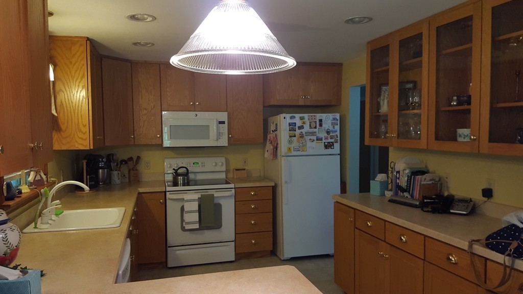 7 Pompano Road Worcester, MA 01605 - Photo 7 of 29 a kitchen with stainless steel appliances granite countertop a sink a stove and a refrigerator