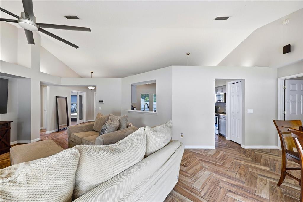 224 Bryan Oak Avenue Brandon, FL 33511 - Photo 13 of 33 a bedroom with a bed and wooden floor