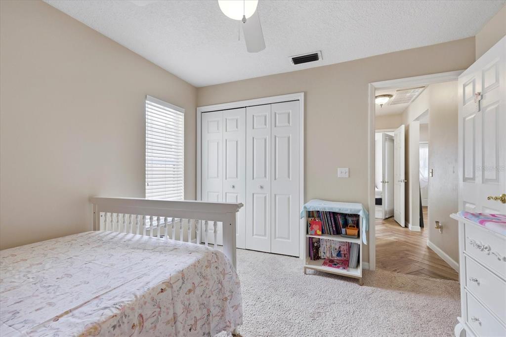 224 Bryan Oak Avenue Brandon, FL 33511 - Photo 19 of 33 a bedroom with a bed and a window
