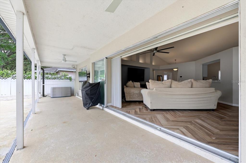 224 Bryan Oak Avenue Brandon, FL 33511 - Photo 27 of 33 a living room with furniture and large windows
