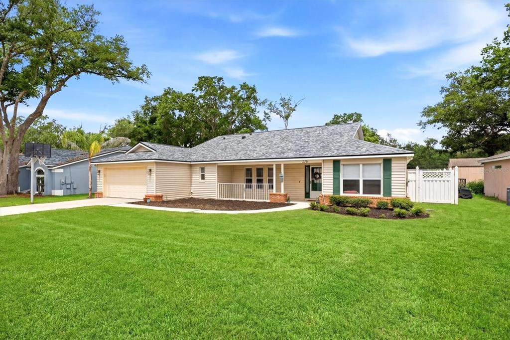 224 Bryan Oak Avenue Brandon, FL 33511 - Photo 33 of 33 a front view of a house with a garden