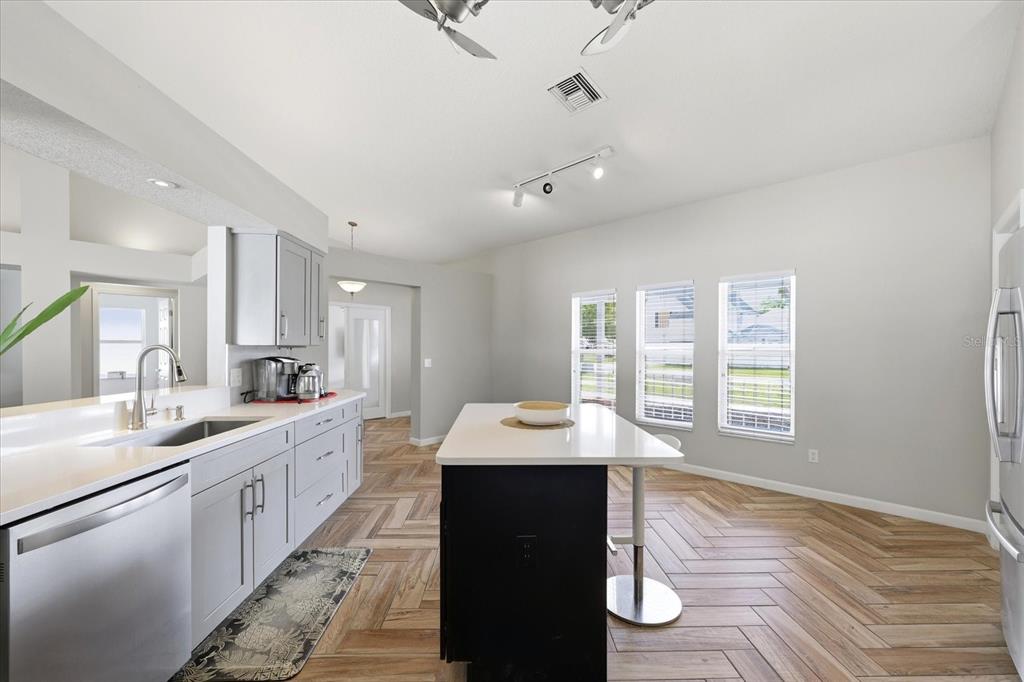 224 Bryan Oak Avenue Brandon, FL 33511 - Photo 10 of 33 a large kitchen with a lot of counter space and a wooden floor