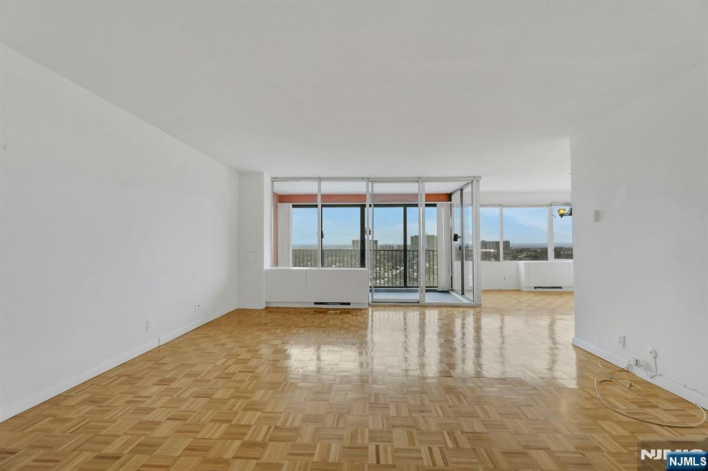 6 Horizon Road, Unit 1508 Fort Lee, NJ 07024 - Photo 19 of 46 a view of empty room with floor to ceiling window