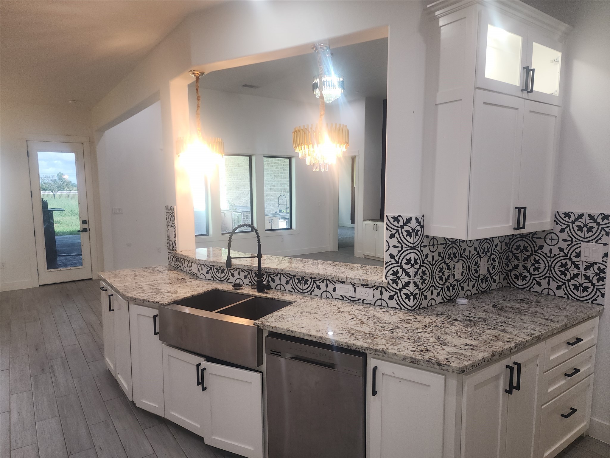 214 Lakeland Circle Rosharon, TX 77583 - Photo 14 of 34 a bathroom with a granite countertop sink and a mirror