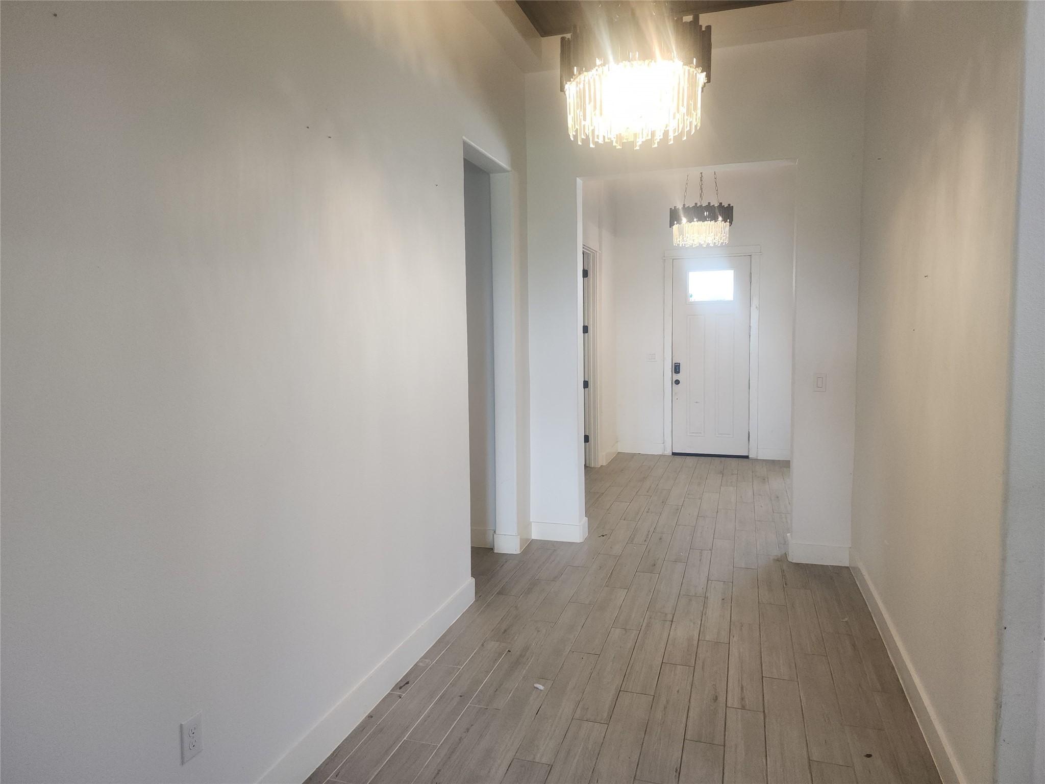 214 Lakeland Circle Rosharon, TX 77583 - Photo 2 of 34 a view of a room with wooden floor and a window