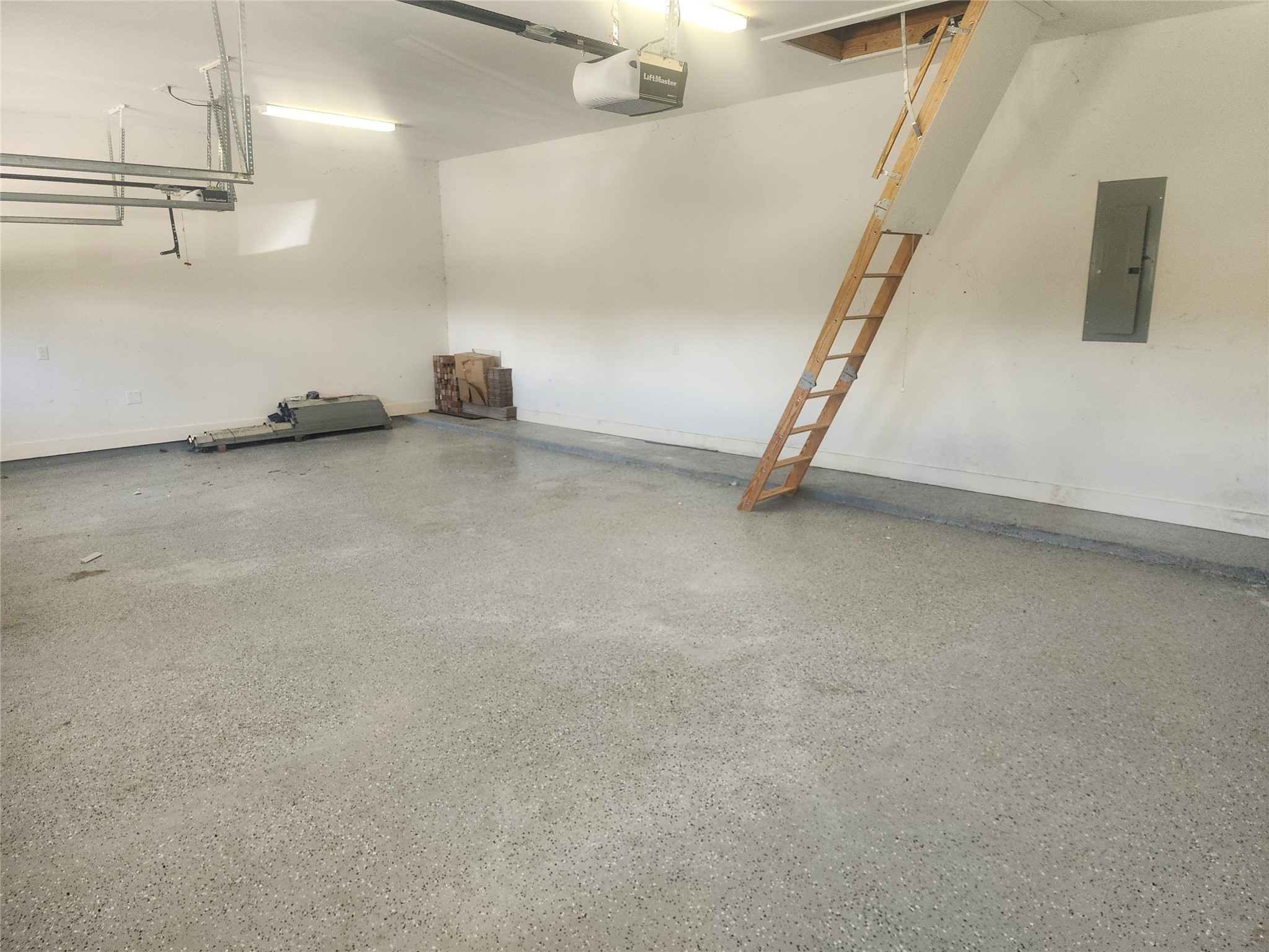 214 Lakeland Circle Rosharon, TX 77583 - Photo 27 of 34 a view of a room with racks on the wall