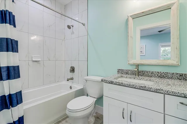 a swimming pool view with a outdoor seating space