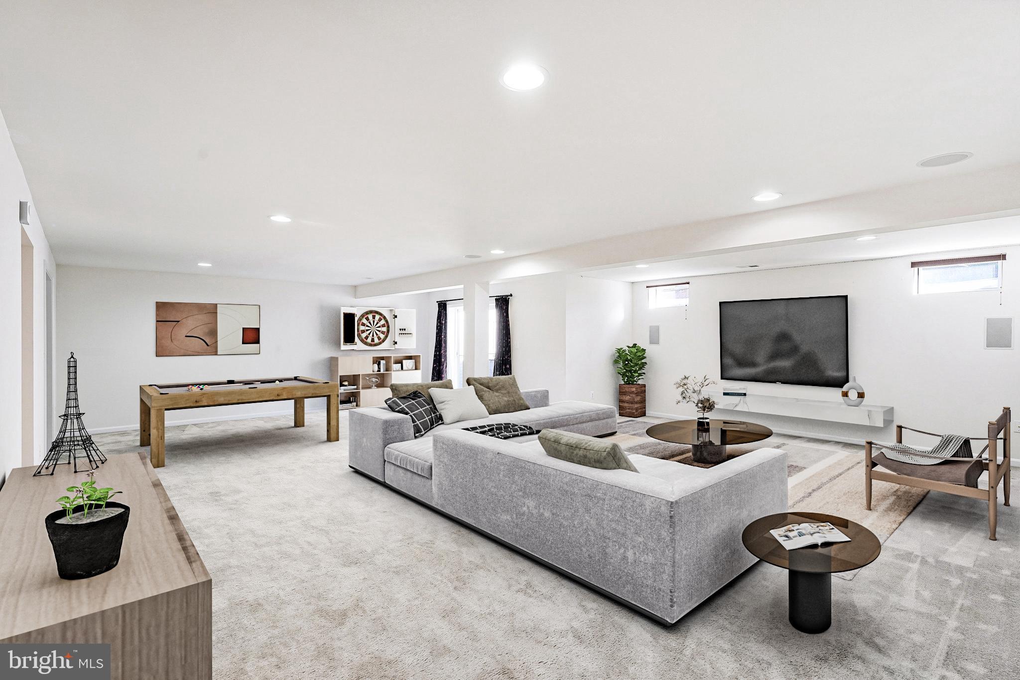 16012 Imperial Eagle Court Woodbridge, VA 22191 - Photo 20 of 25 a living room with furniture and a flat screen tv