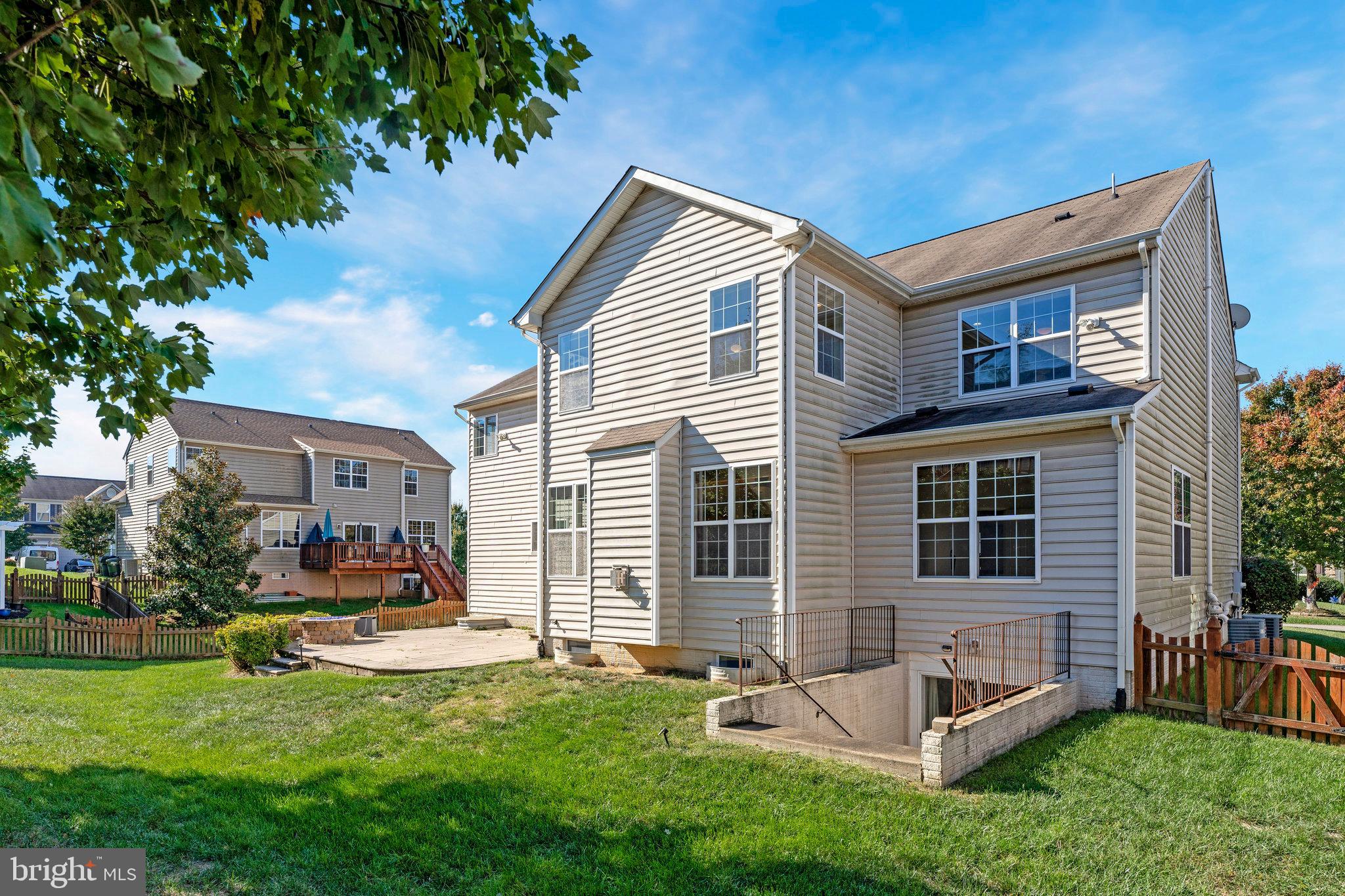 16012 Imperial Eagle Court Woodbridge, VA 22191 - Photo 23 of 25 a view of house with a backyard