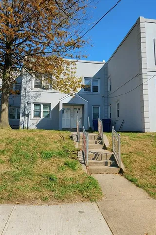 a view of a house with swimming pool