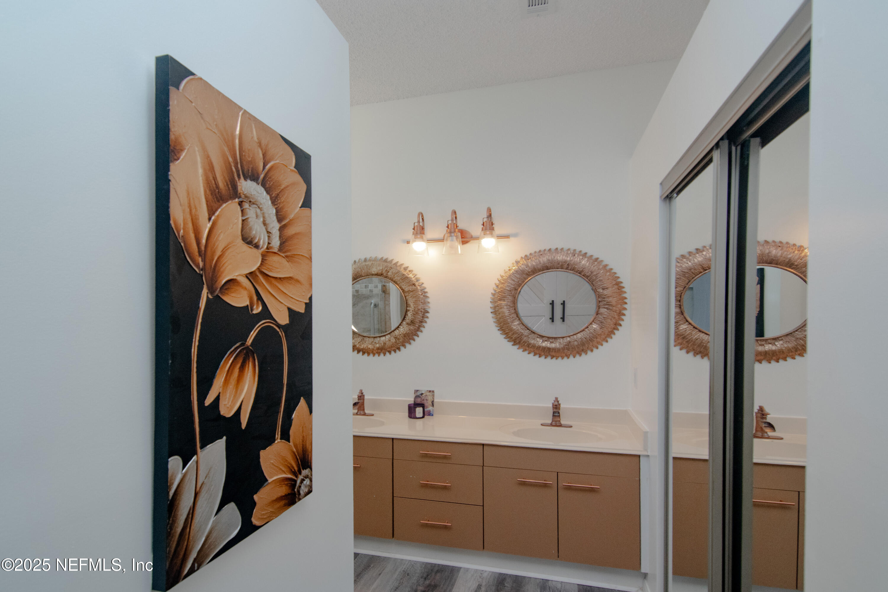 358 Monika Place St. Augustine, FL 32080 - Photo 13 of 32 a view of bathroom with a sink and a mirror