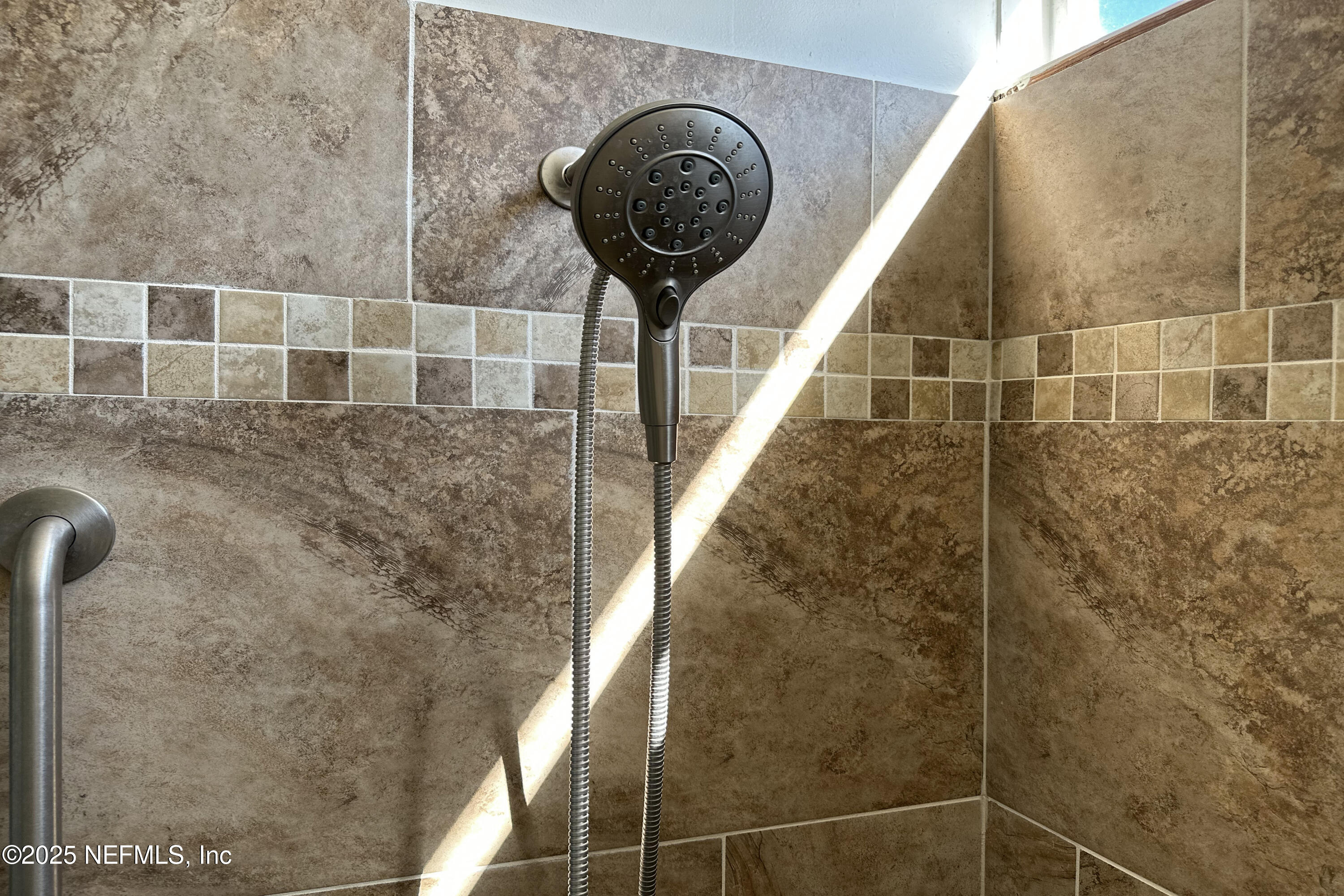 358 Monika Place St. Augustine, FL 32080 - Photo 15 of 32 a bathroom with a shower