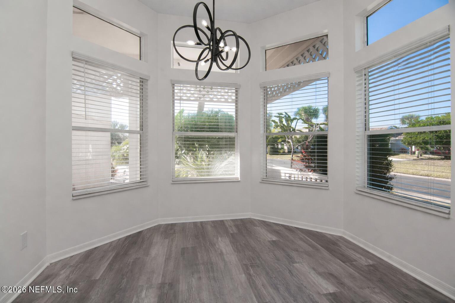 358 Monika Place St. Augustine, FL 32080 - Photo 17 of 41 a view of an entryway with wooden floor and windows