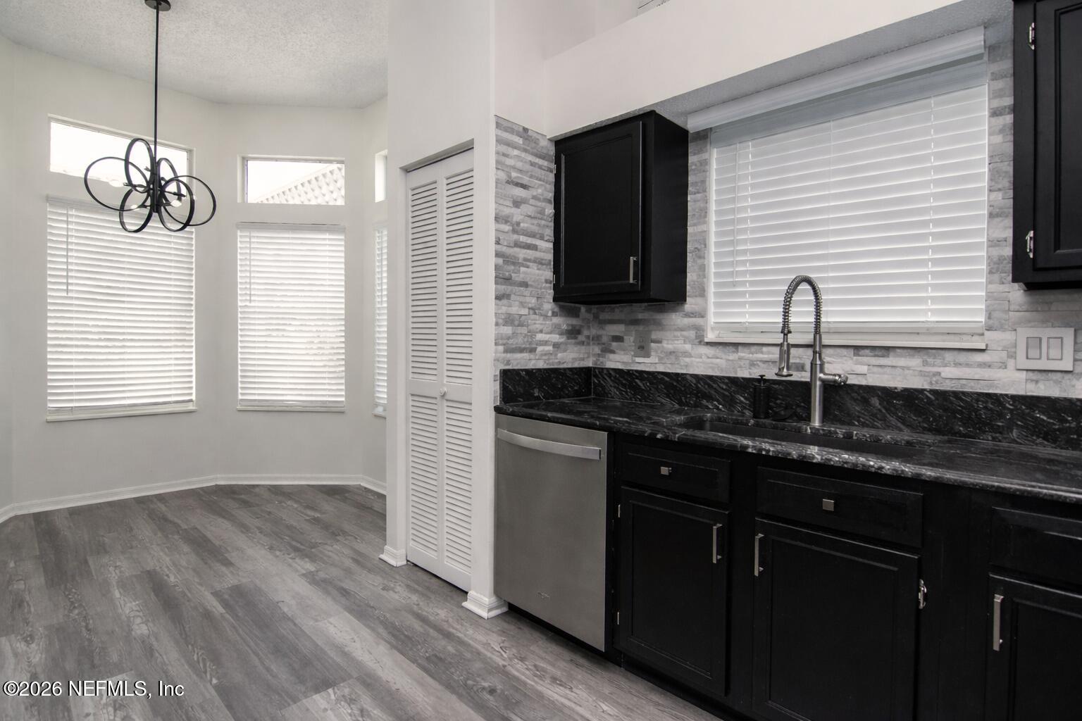 358 Monika Place St. Augustine, FL 32080 - Photo 19 of 41 a kitchen with a sink and a window