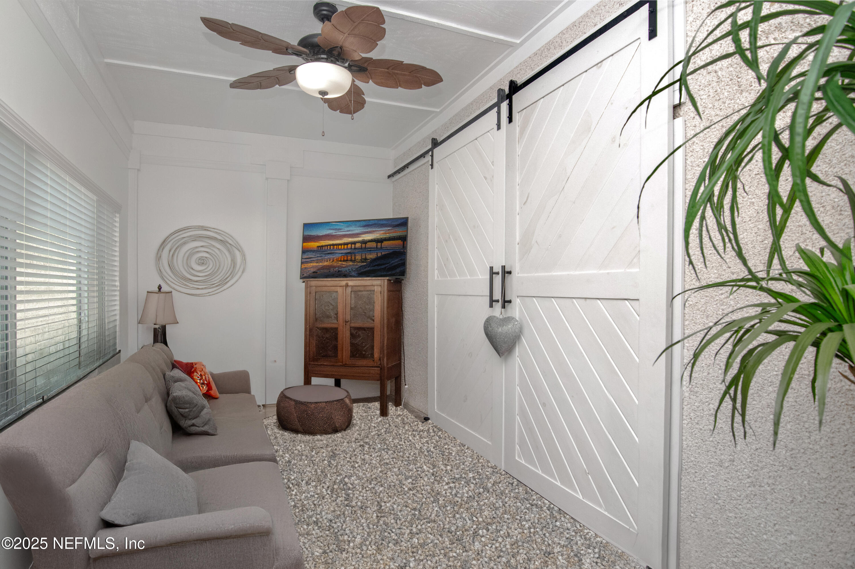 358 Monika Place St. Augustine, FL 32080 - Photo 18 of 32 a living room with furniture and a rug