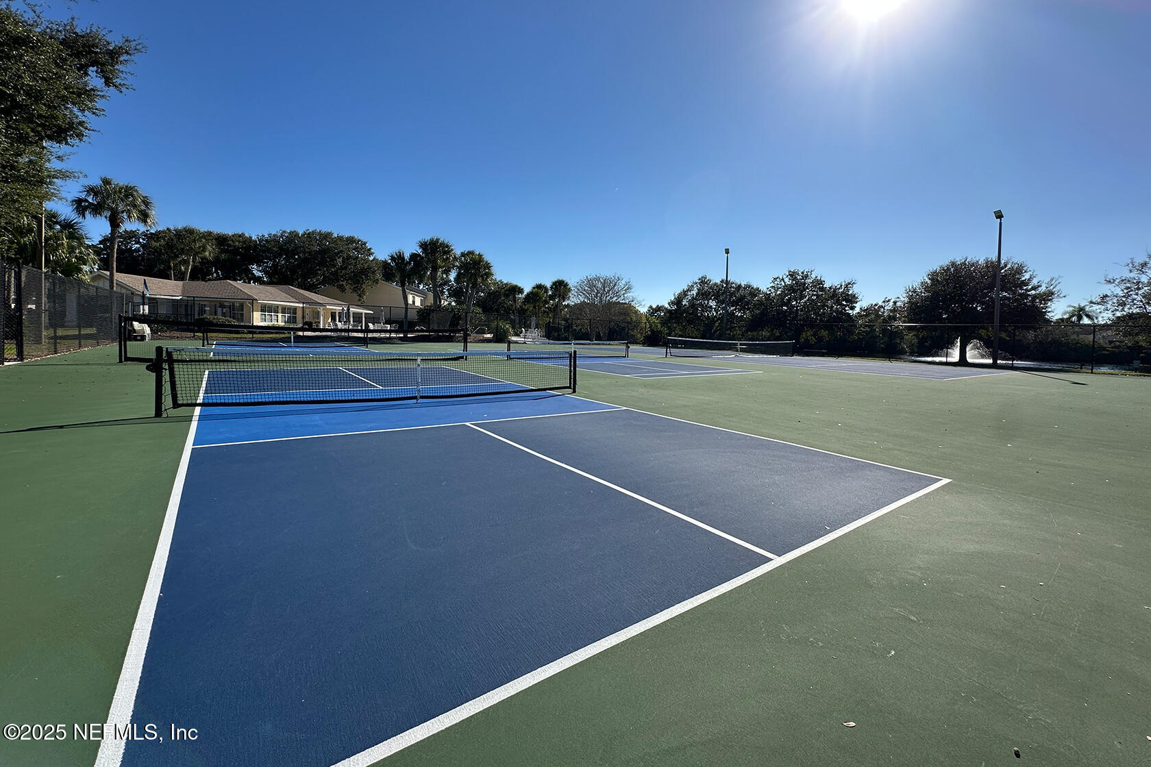 358 Monika Place St. Augustine, FL 32080 - Photo 32 of 41 a view of an outdoor space and tennis court