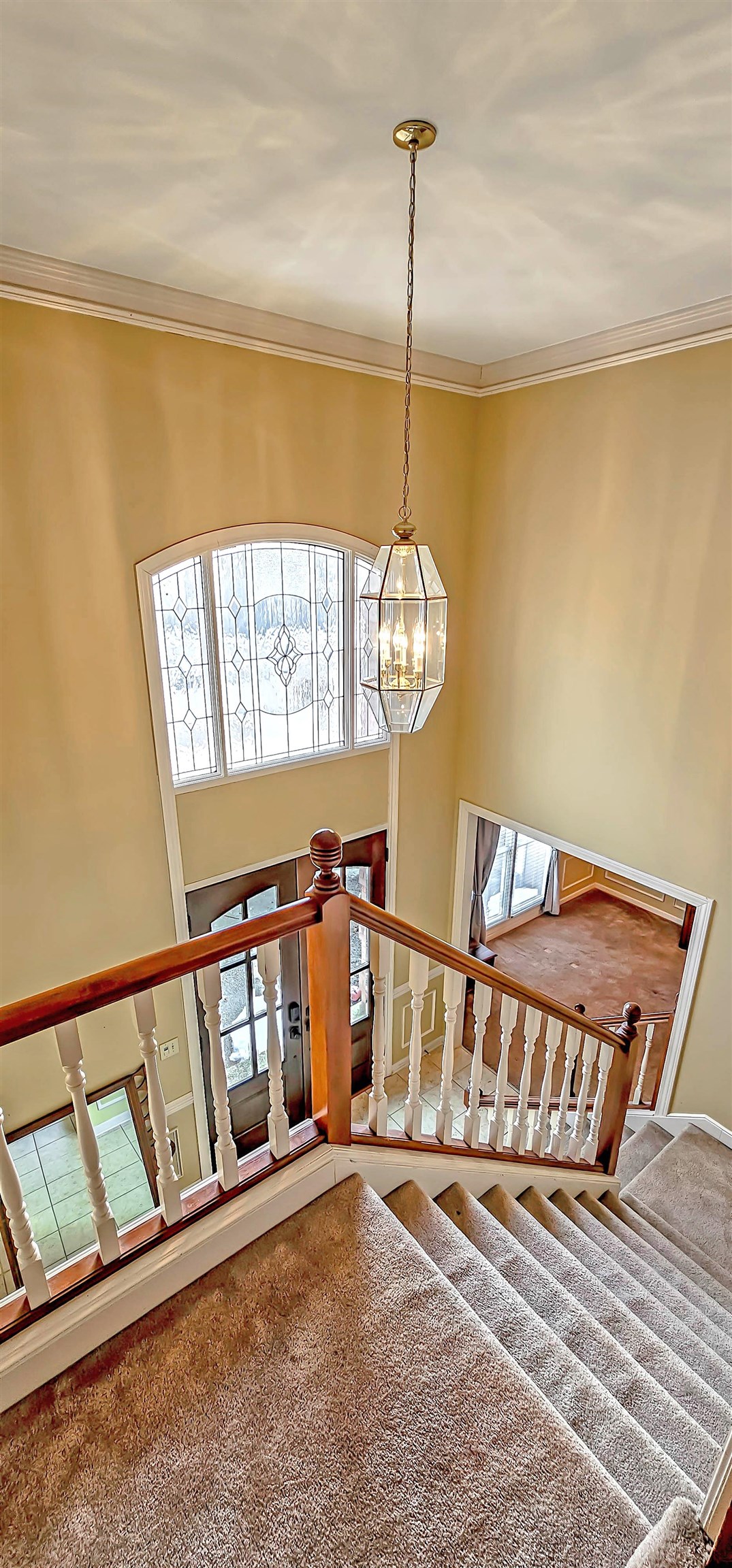 660 Weston Drive Collierville, TN 38017 - Photo 18 of 32 Stairway featuring plenty of natural light and a high ceiling