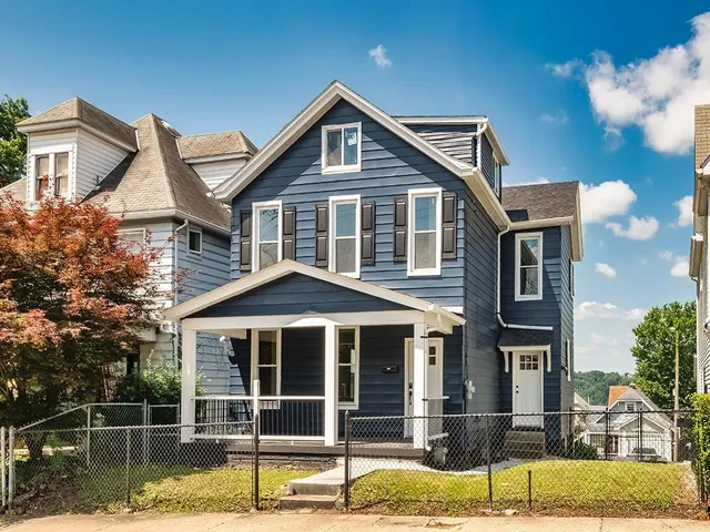 a front view of a house with a porch