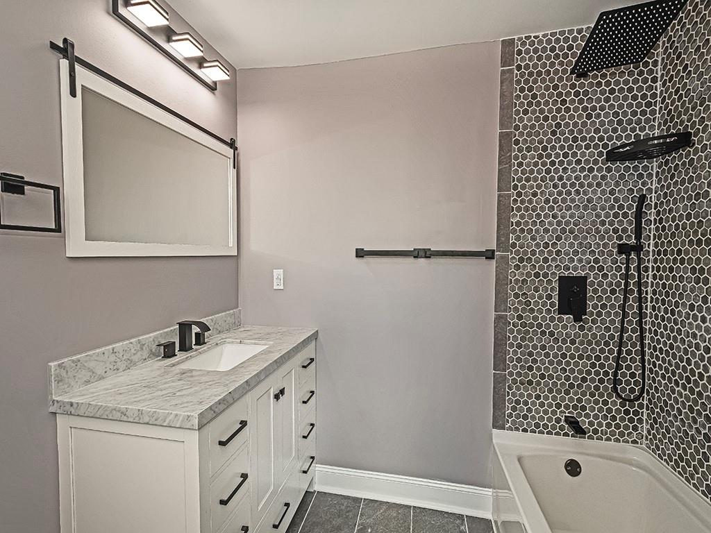 1741 Freeport Road New Kensington, PA 15068 - Photo 15 of 28 a bathroom with a sink a toilet and shower