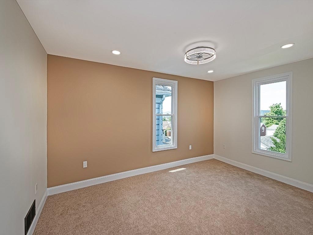 1741 Freeport Road New Kensington, PA 15068 - Photo 19 of 28 an empty room with windows and yard