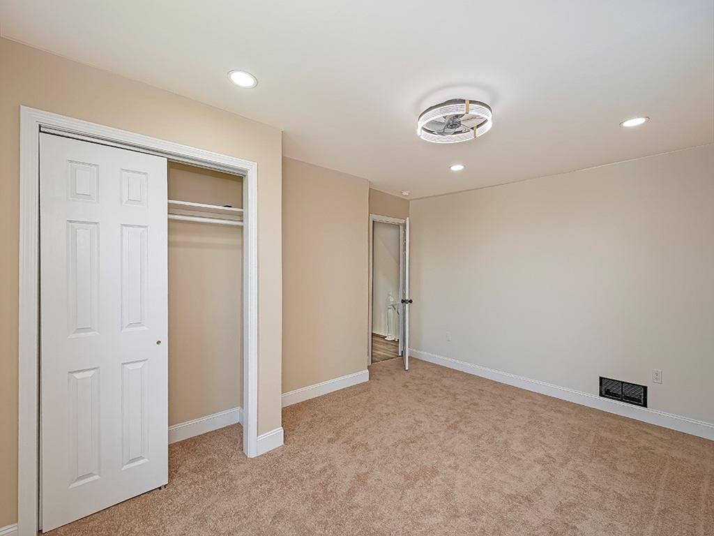 1741 Freeport Road New Kensington, PA 15068 - Photo 20 of 28 an empty room with closet and a chandelier fan