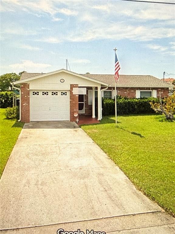 4499 Bahama Drive Hernando Beach, FL 34607 - Photo 1 of 1 a view of a white building