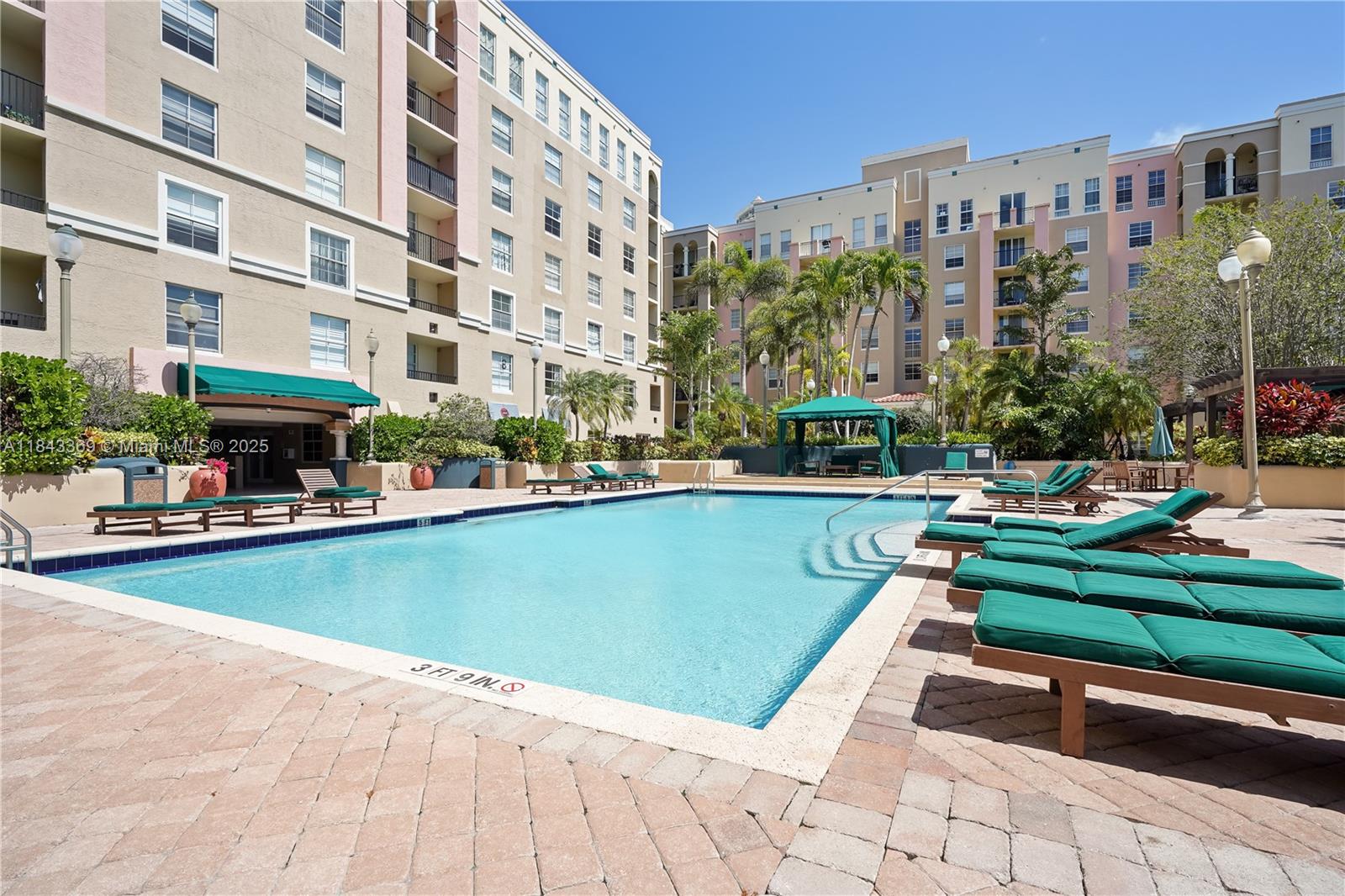 520 Southeast 5th Avenue, Unit 3503 Fort Lauderdale, FL 33301 - Photo 12 of 37 a view of swimming pool with outdoor seating and a garden