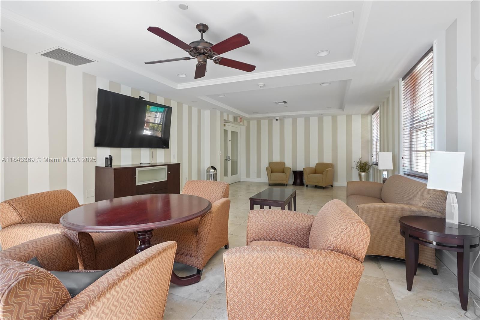 520 Southeast 5th Avenue, Unit 3503 Fort Lauderdale, FL 33301 - Photo 18 of 37 a living room with furniture a ceiling fan and a window