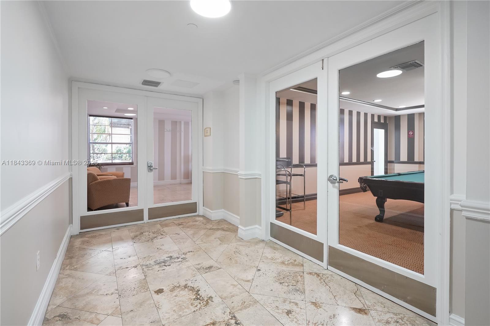 520 Southeast 5th Avenue, Unit 3503 Fort Lauderdale, FL 33301 - Photo 19 of 37 a view of livingroom with a flat screen tv and staircase