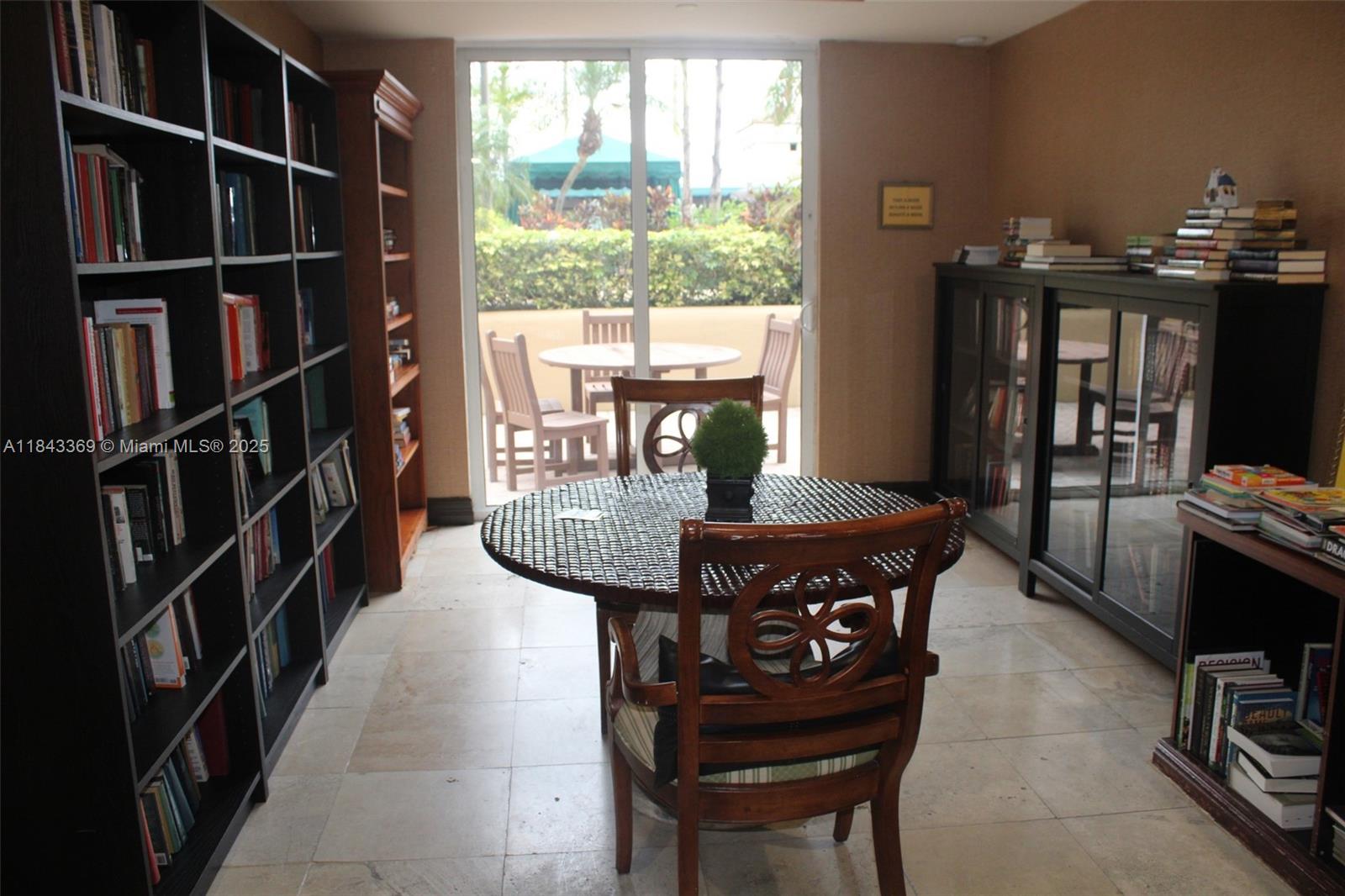 520 Southeast 5th Avenue, Unit 3503 Fort Lauderdale, FL 33301 - Photo 20 of 37 a view of a dining room with furniture and a window