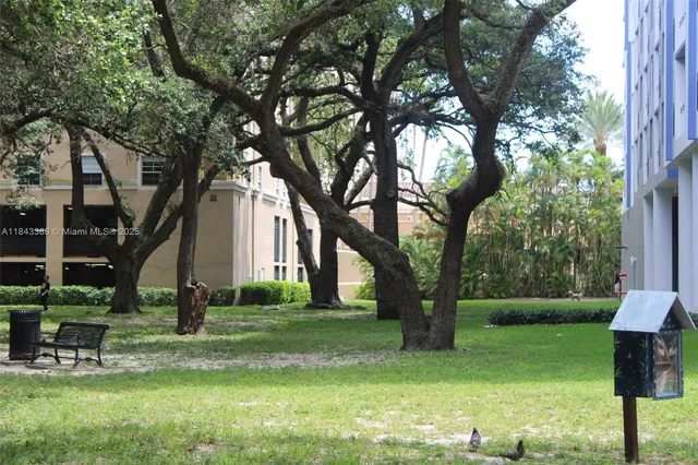 a view of park with trees