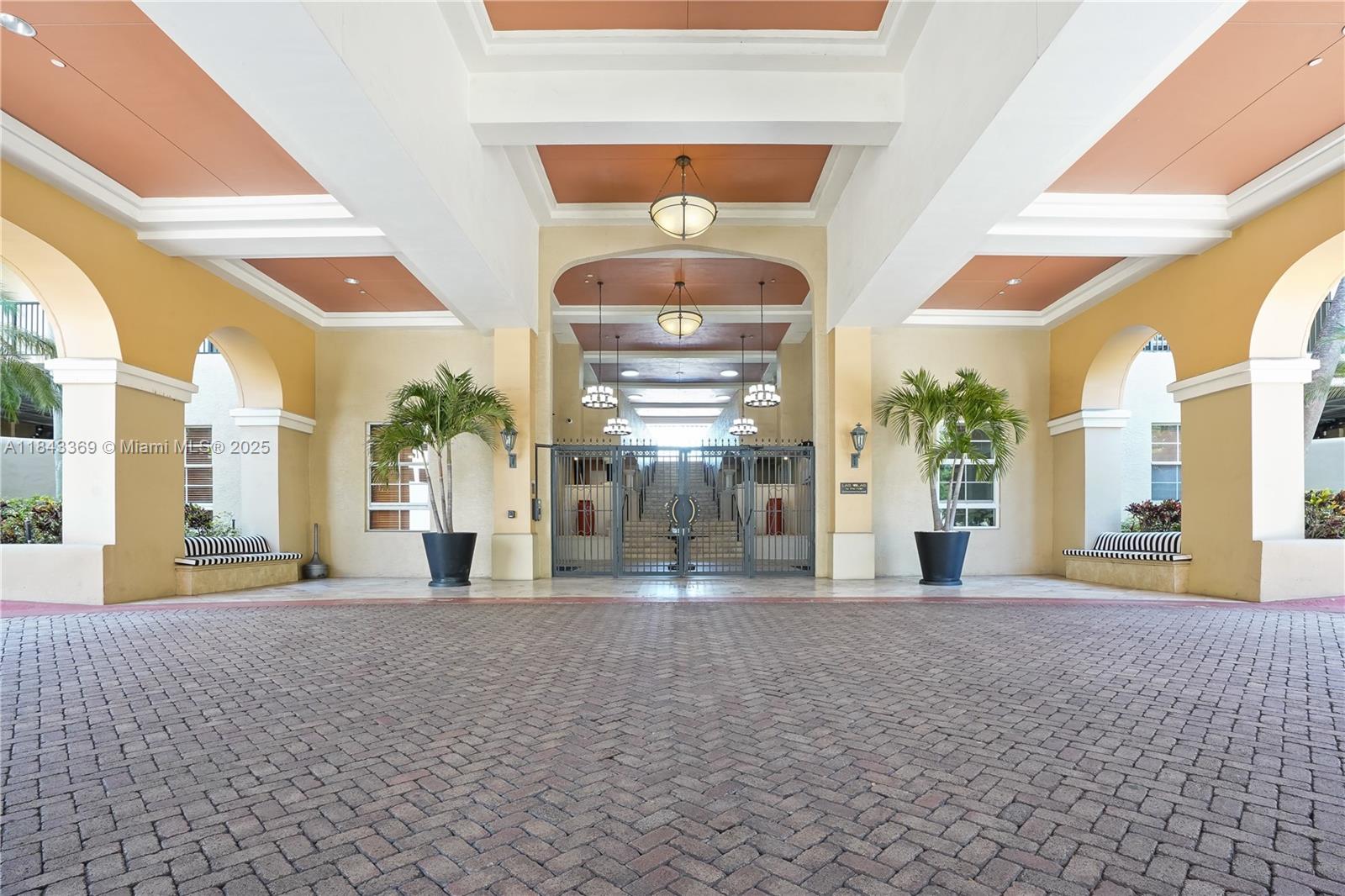 520 Southeast 5th Avenue, Unit 3503 Fort Lauderdale, FL 33301 - Photo 6 of 37 a view of a big room with windows and chandelier