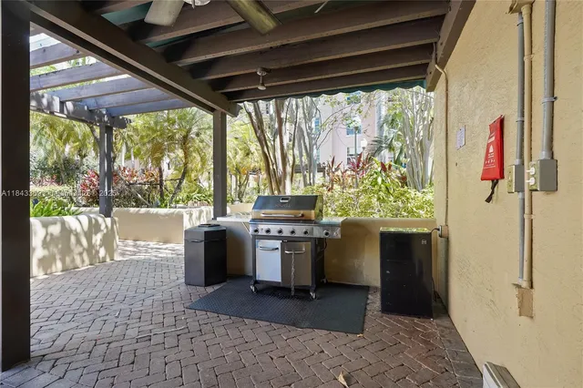 a kitchen with a stove and a refrigerator