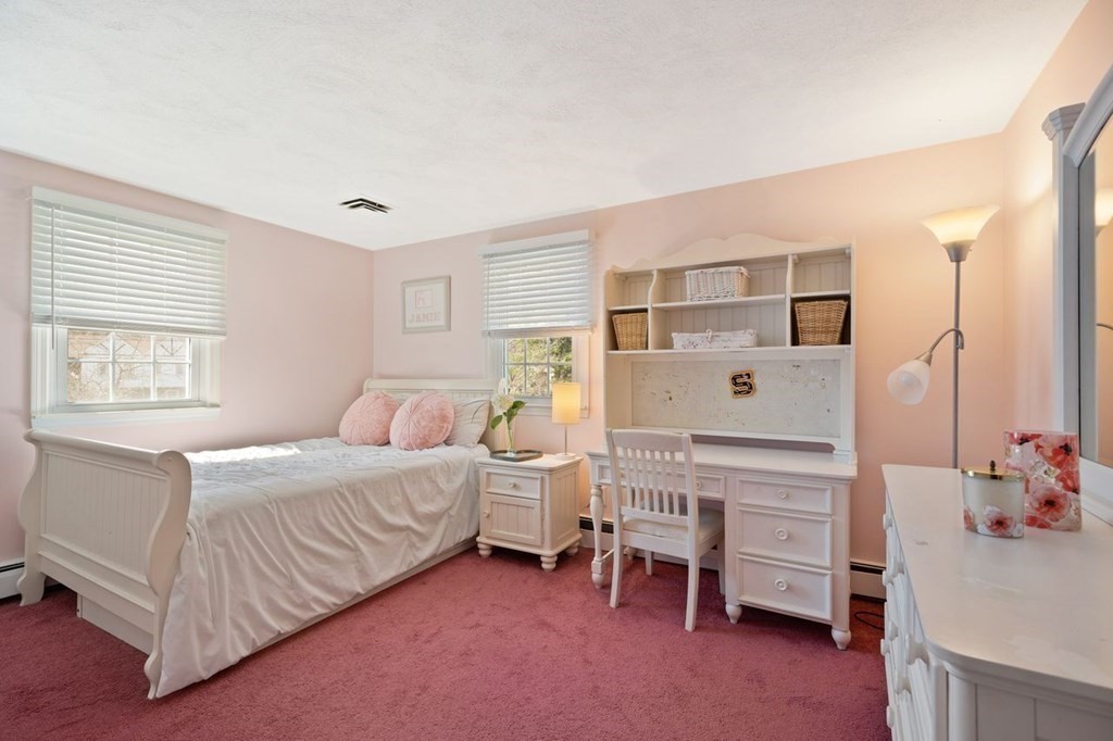 22 Kennedy Road Sharon, MA 02067 - Photo 20 of 41 a bedroom with a bed and a cabinets