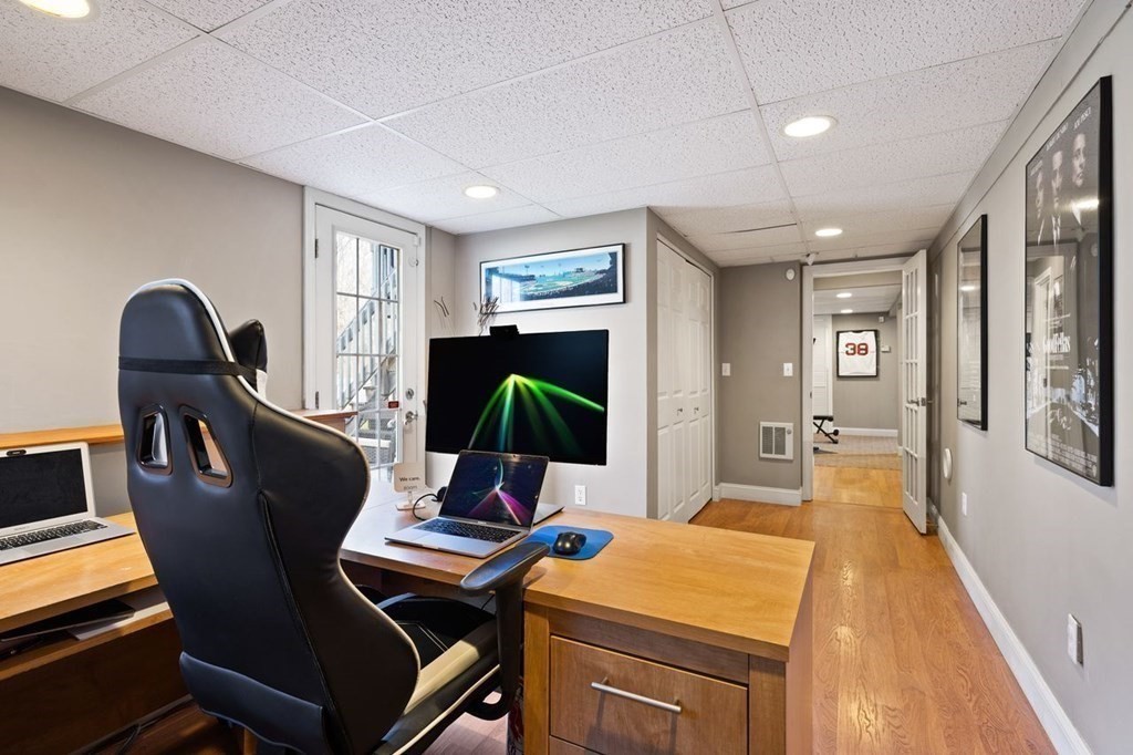 22 Kennedy Road Sharon, MA 02067 - Photo 24 of 41 a room with furniture and a flat screen tv
