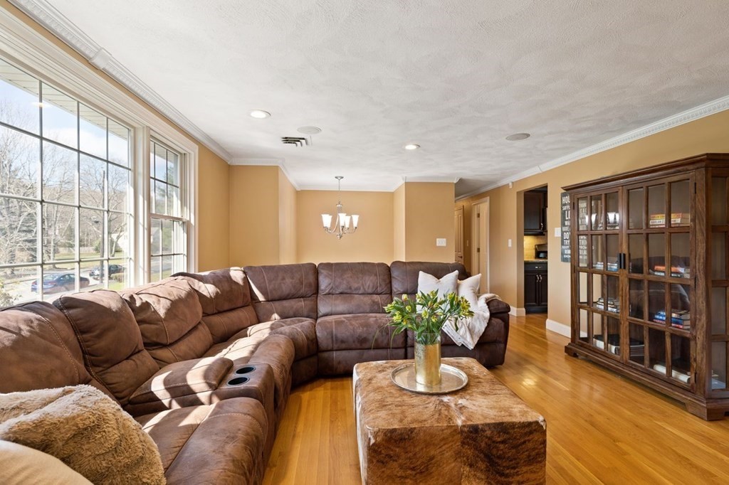 22 Kennedy Road Sharon, MA 02067 - Photo 7 of 41 a living room with furniture and a large window