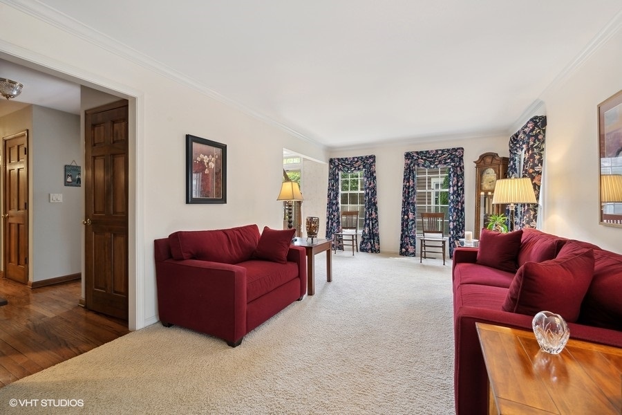 1612 Stonebridge Trail Wheaton, IL 60189 - Photo 4 of 22 a living room with furniture and a window