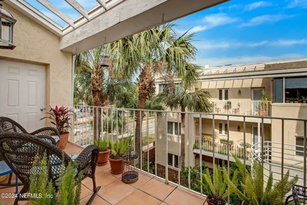 a bathroom with a sink mirror bathtub and shower