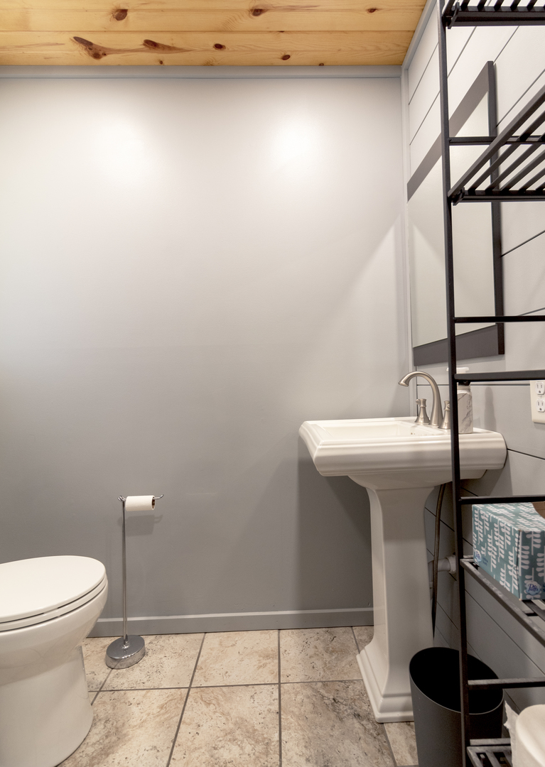 1455 North Gorham Road Morris, IL 60450 - Photo 14 of 22 a bathroom with a sink a toilet and mirror